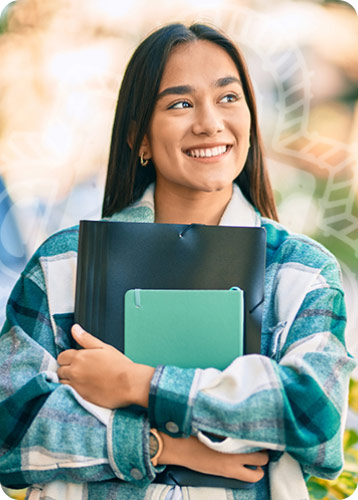 Person holder her books with a thoughtful look and smiling.