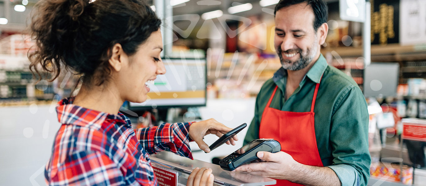 Person using their phone to pay for groceries.